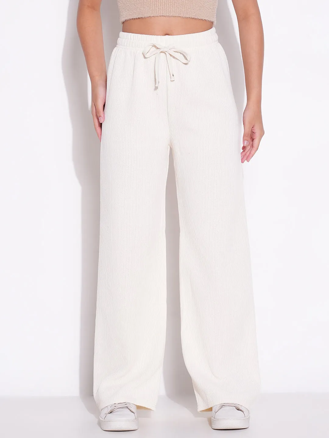 Women Off White Solid Parallel Trousers