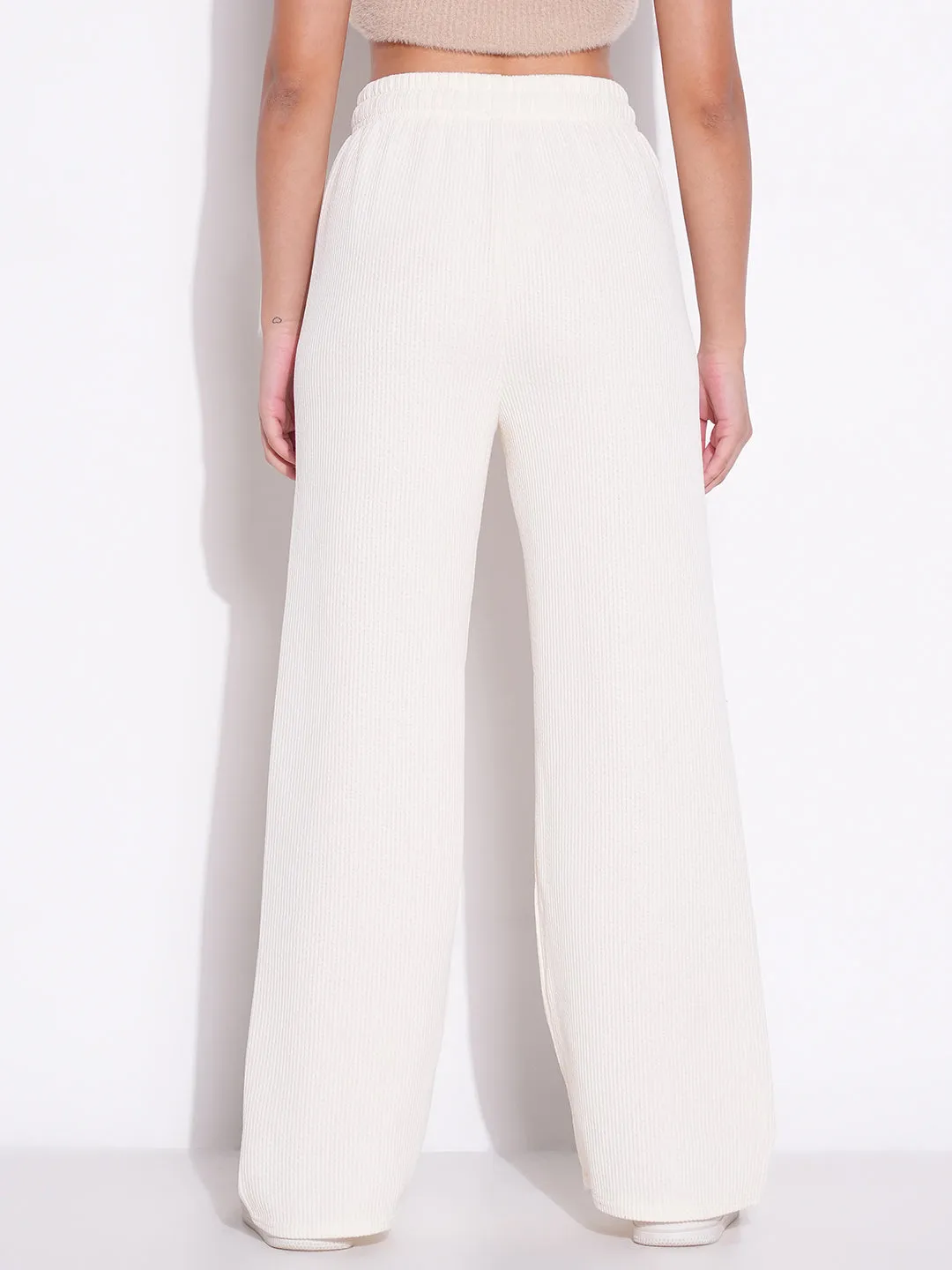 Women Off White Solid Parallel Trousers