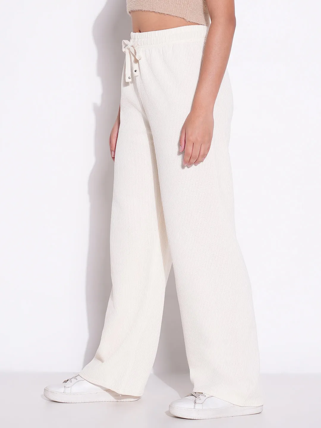 Women Off White Solid Parallel Trousers